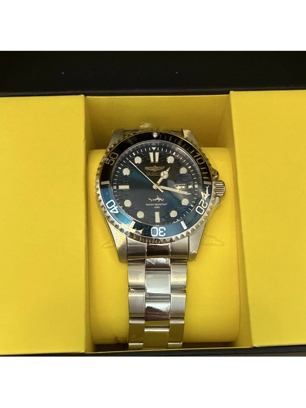 Invicta Silver Stainless Steel Watch with Blue Accents